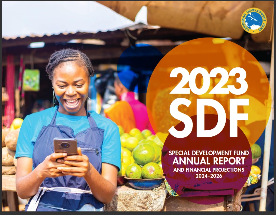 Cover image of the 2023 Special Development Fund (SDF) Annual Report and Financial Projections 2024–2026 by the Caribbean Development Bank. The image shows a smiling woman in a blue apron using a smartphone in a vibrant market setting, with colorful produce like oranges and avocados in the background.
