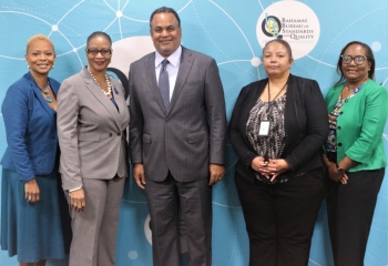 Bahamas Minister of Economic Affairs and Trade Michael Halkitis and BBSQ team