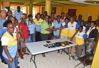 group photo of farmers at a meeting